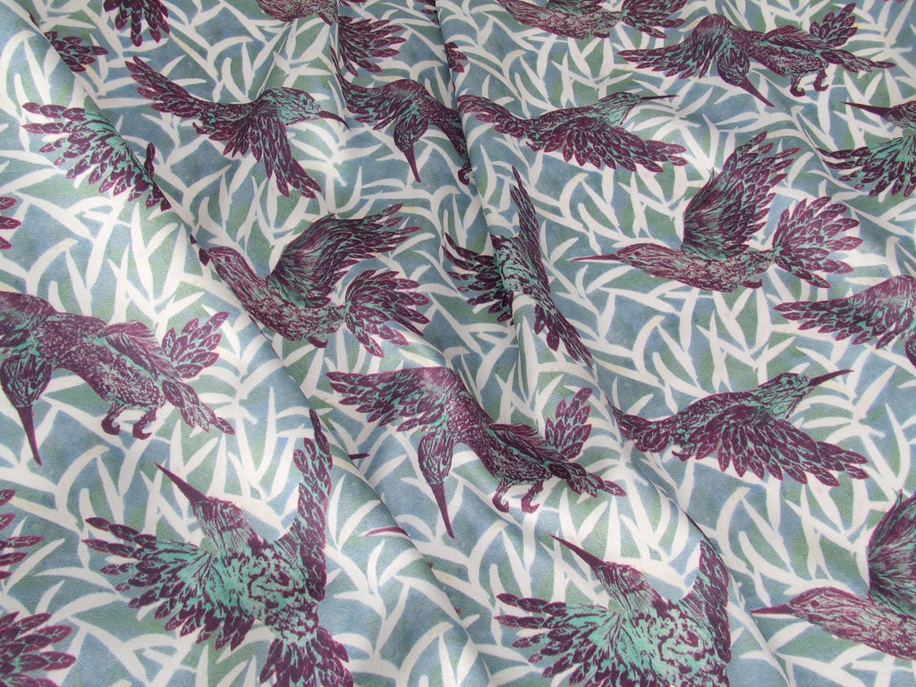 Purple hummingbird fabric