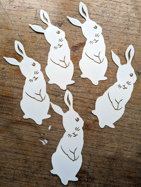 Group of laser cut rabbits