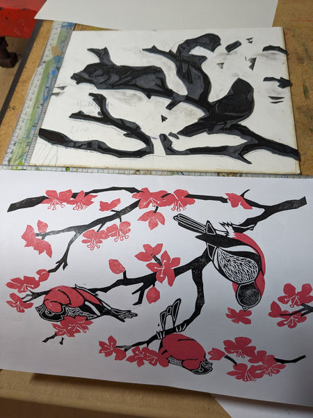 Two colour bullfinch linocut printed up