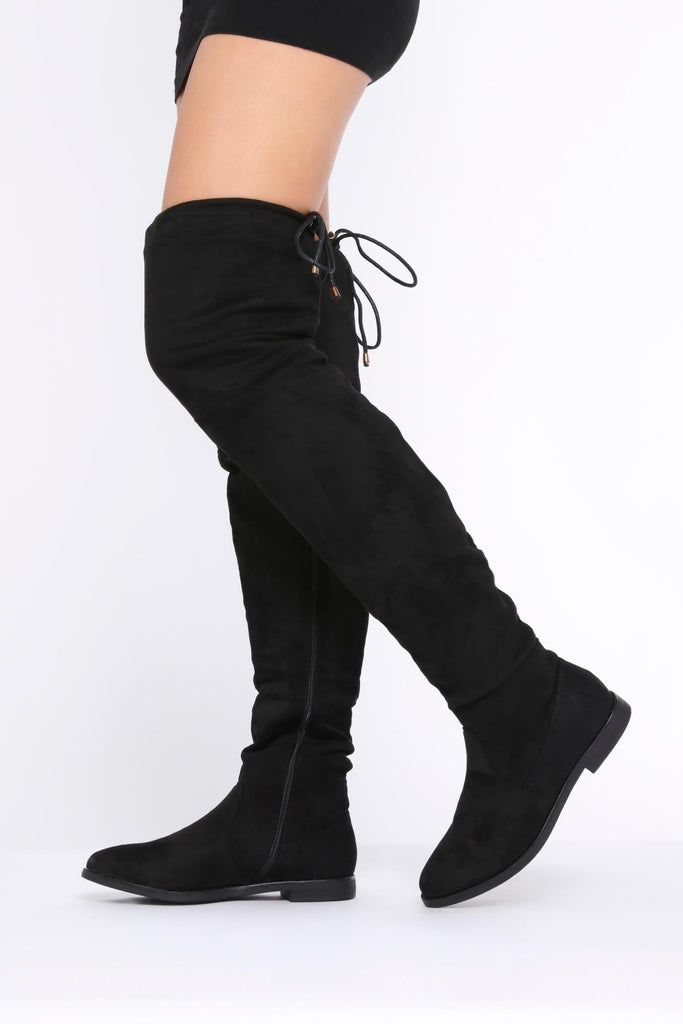black flat high knee boots