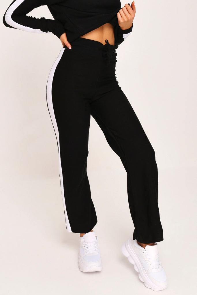 black trousers with black side stripe