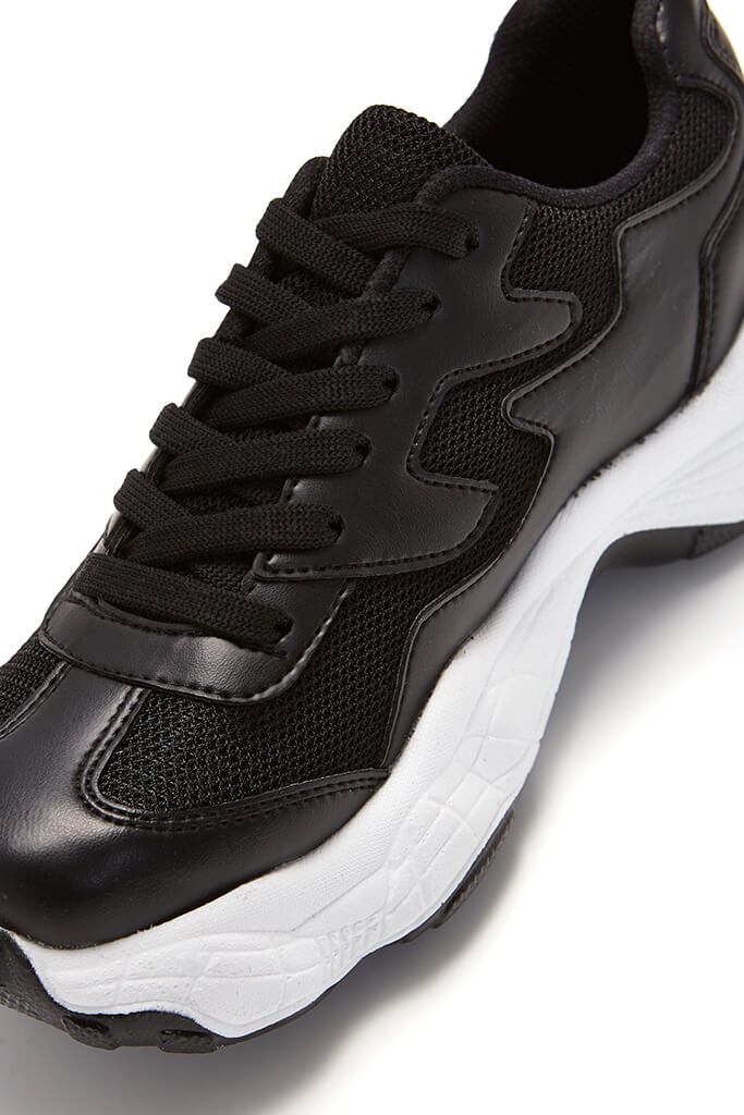 black chunky sole trainers