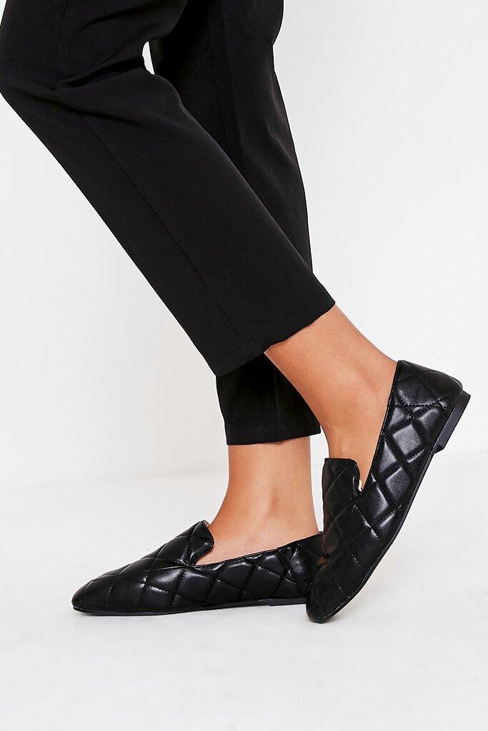 black quilted loafers