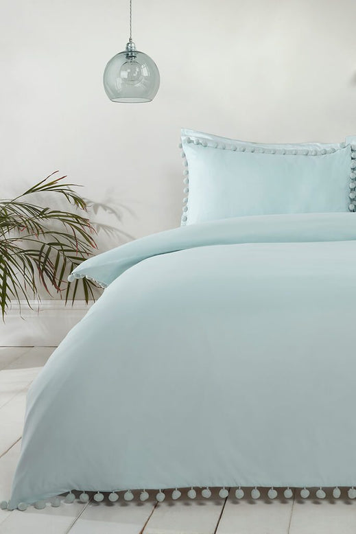 blue pom pom bedding