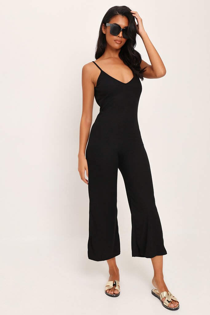 black plunge neck jumpsuit