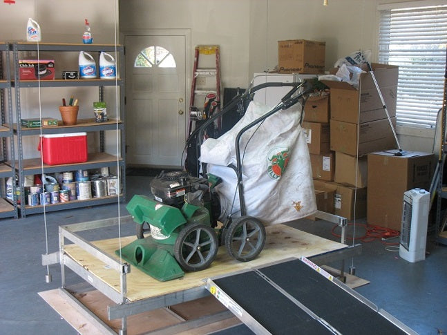 large attic lift with lawn mower