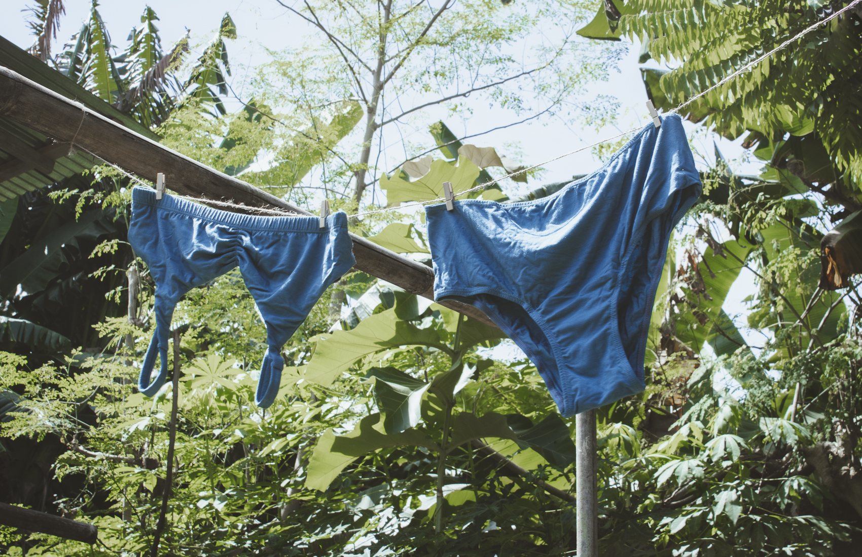 Hanging clothes to dry dye