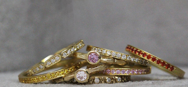 Gold stack rings with coloured gemstones from Melissa Harris Jewellery.