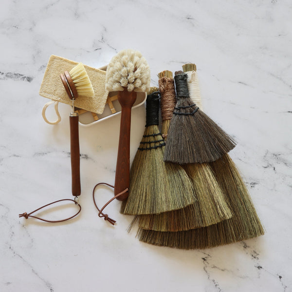 Set of four whisk brooms