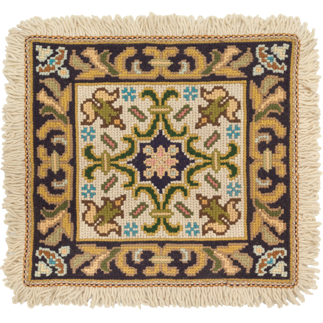 This Portugese Needlepoint Pillowcase was handcrafted in Portugal during the third quarter of the 20th century.  It features a central medallion flanked by four floral forms and surrounded by a c scroll border. The pillowcase is fringed on all four sides.    In excellent condition with no signs of wear.