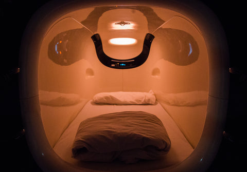 Inside of a capsule hotel pod