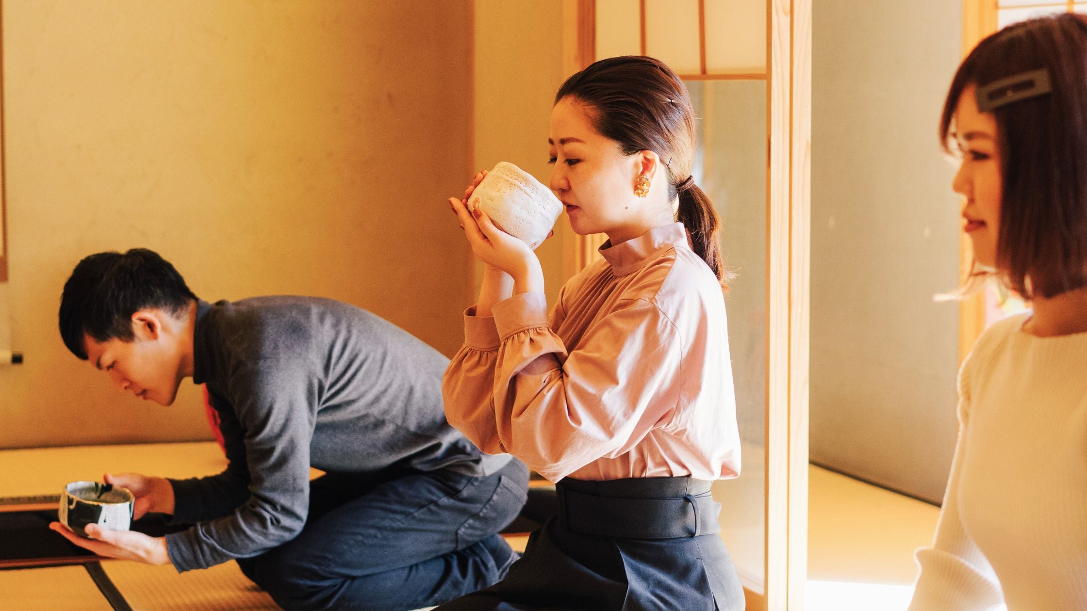 admiring japanese tea bowl chawan