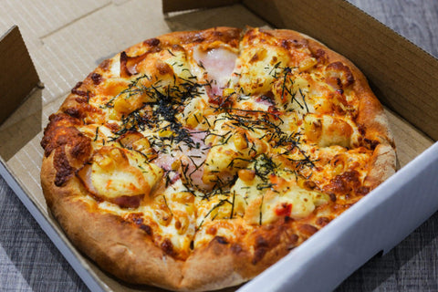 Japanese Pizza topped with nori seaweed