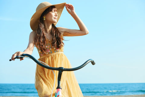 Japanese woman wearing sunscreen