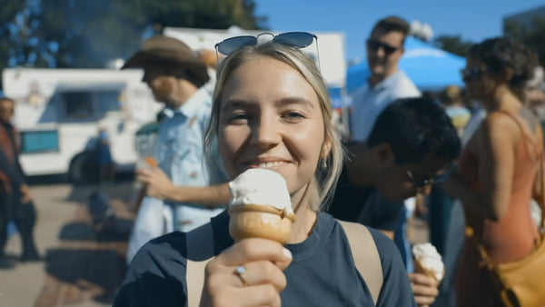 Woman Enjoying A Polar Bros Ice Cream Cone