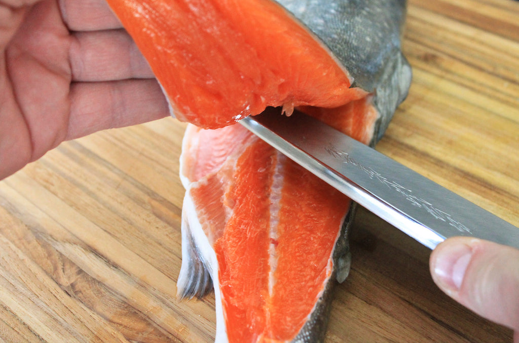 Cutting A Fillet From A Salmon