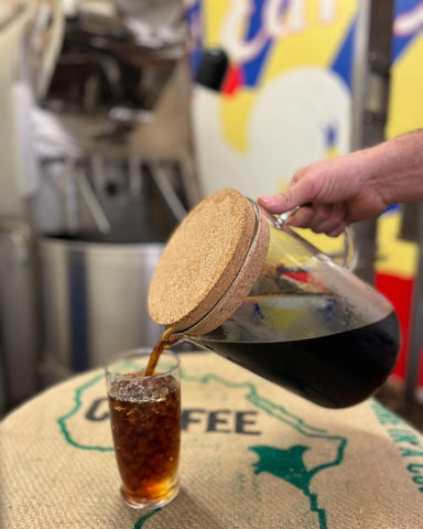 cold brew filter pouch being poured bright and early coffee loring roaster