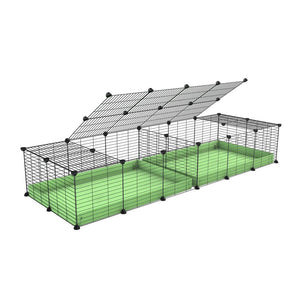 une cavy cage 6x2 avec couvercle et separation pour cochons d'inde qui se battent ou en quarantaine avec coroplast vert kavee