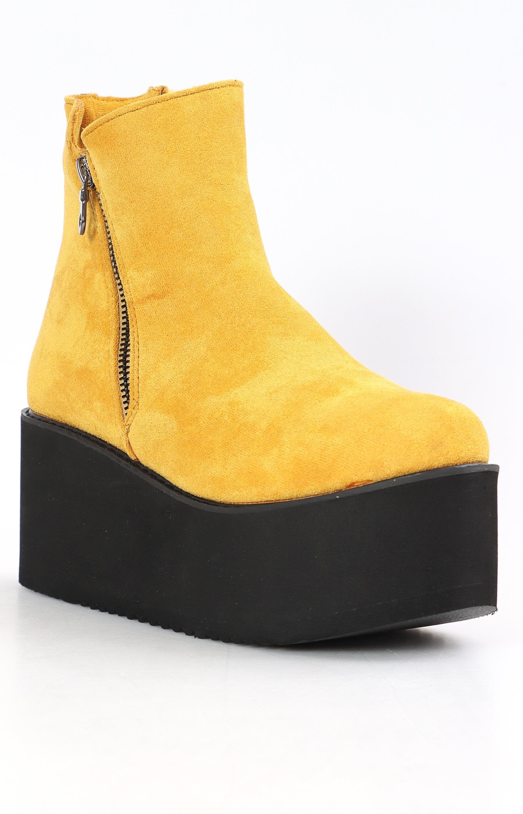 yellow wedge boots