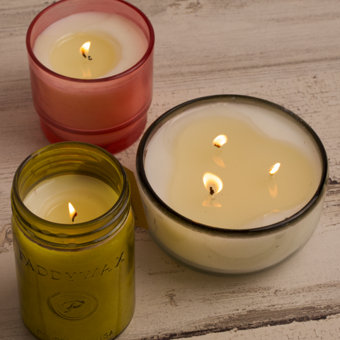 Vanilla Candles - 3 soy wax candles light on wood background