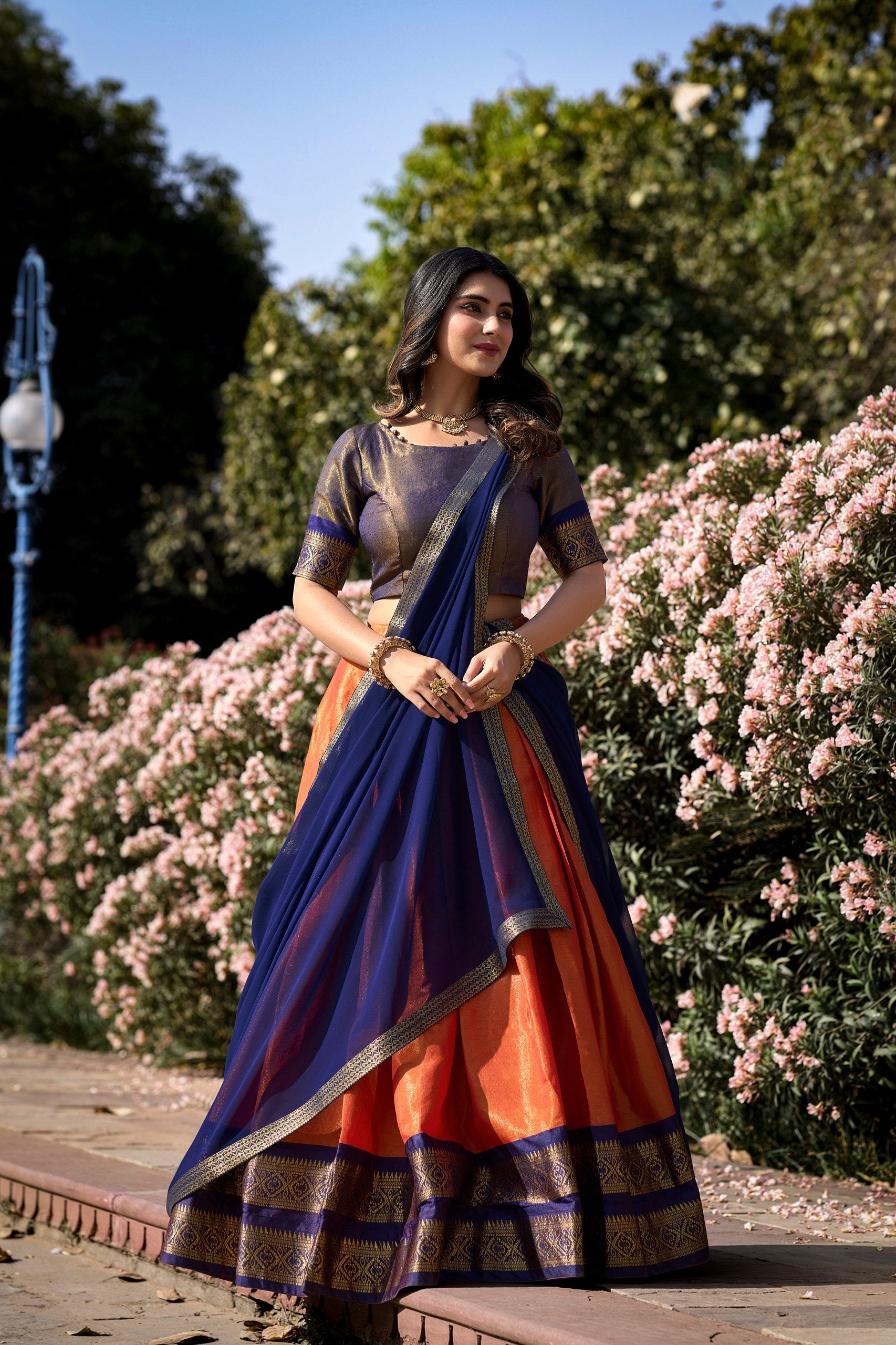 Orange Breathtaking South-Indian Kanchipuram Silk Lehenga Choli Set with Zari Weaving ClothsVilla