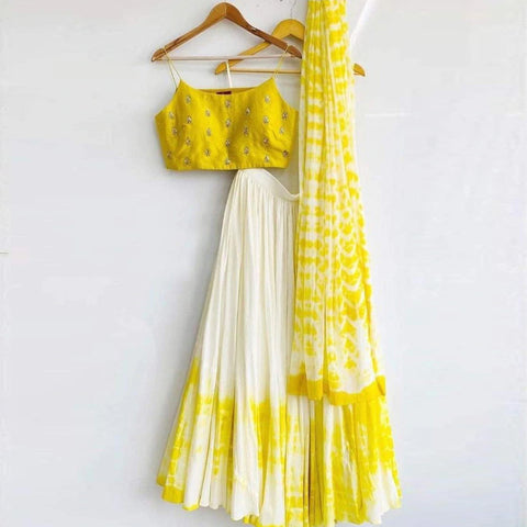 Shibori Marble Dyed Lehenga with Raw Silk Hand Embroidered Blouse In Yellow Color