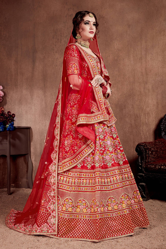 Flattering Red Colored Designer Bridal wear Embroidered Lehenga Choli