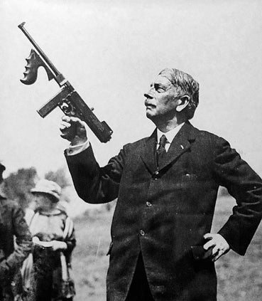 Thompson-holding-his-new-weapon.jpg__PID:5712b614-0aaa-4dfb-bb7b-d8858c22ea5b