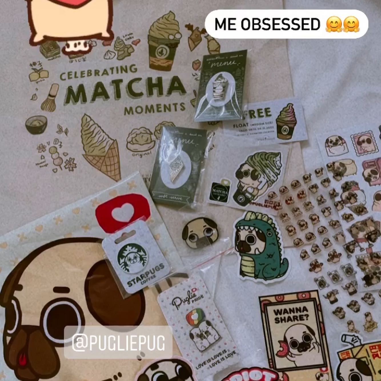 Photo of some Puglie stickers and pins, along with the Matcha Cafe Maiko special tote bag and pins. Caption says “Me obsessed.”