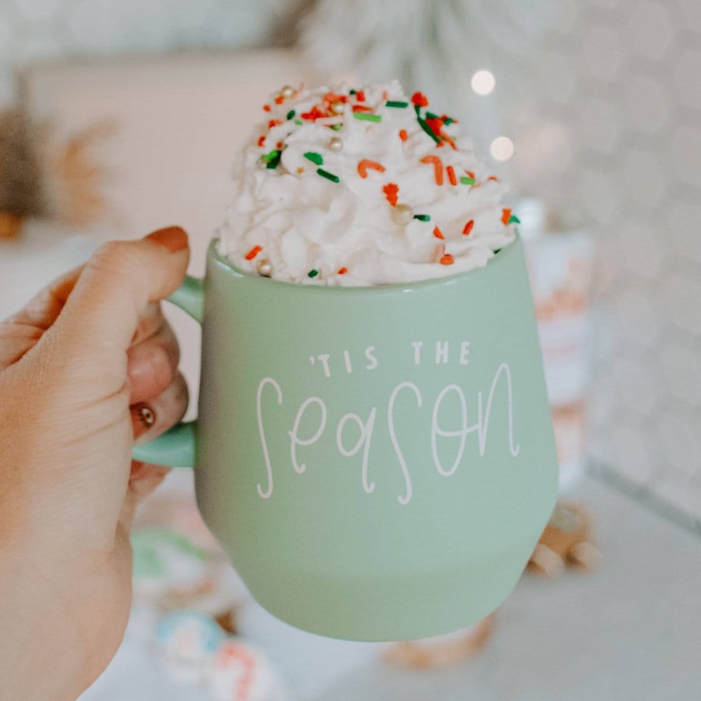 https://cdn.shopify.com/s/files/1/1981/2351/products/tistheseasonmug_1445x.jpg?v=1636644801