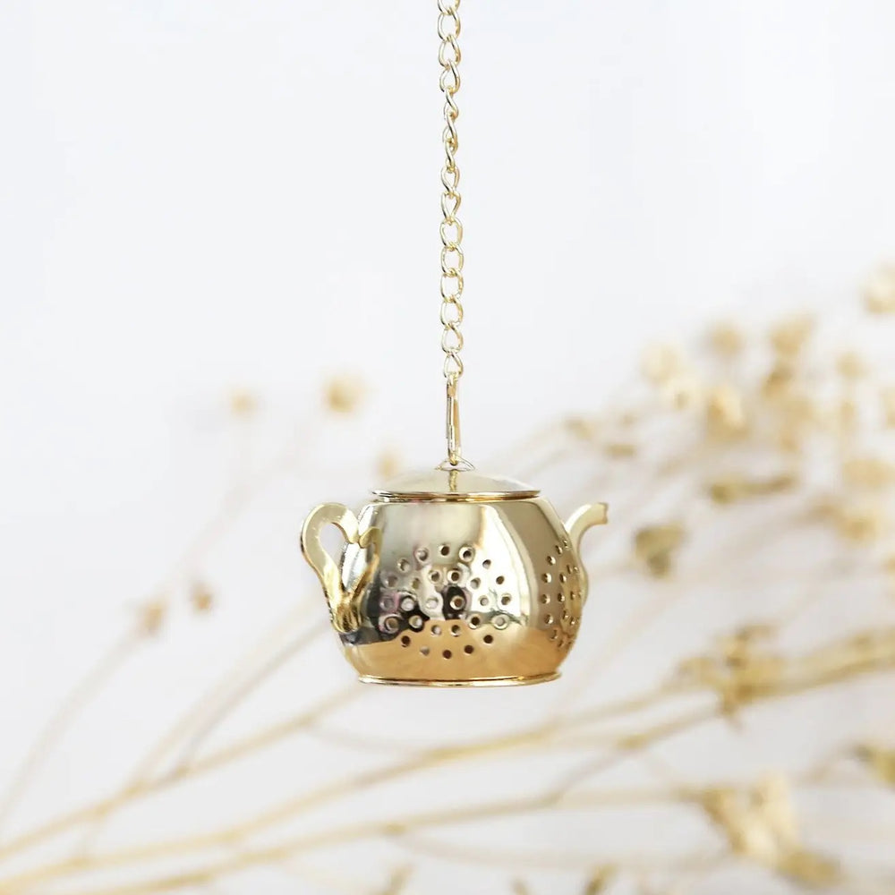 https://cdn.shopify.com/s/files/1/1981/5847/products/TeapotTeaInfuser-Gold_1000x1000.jpg?v=1657214112