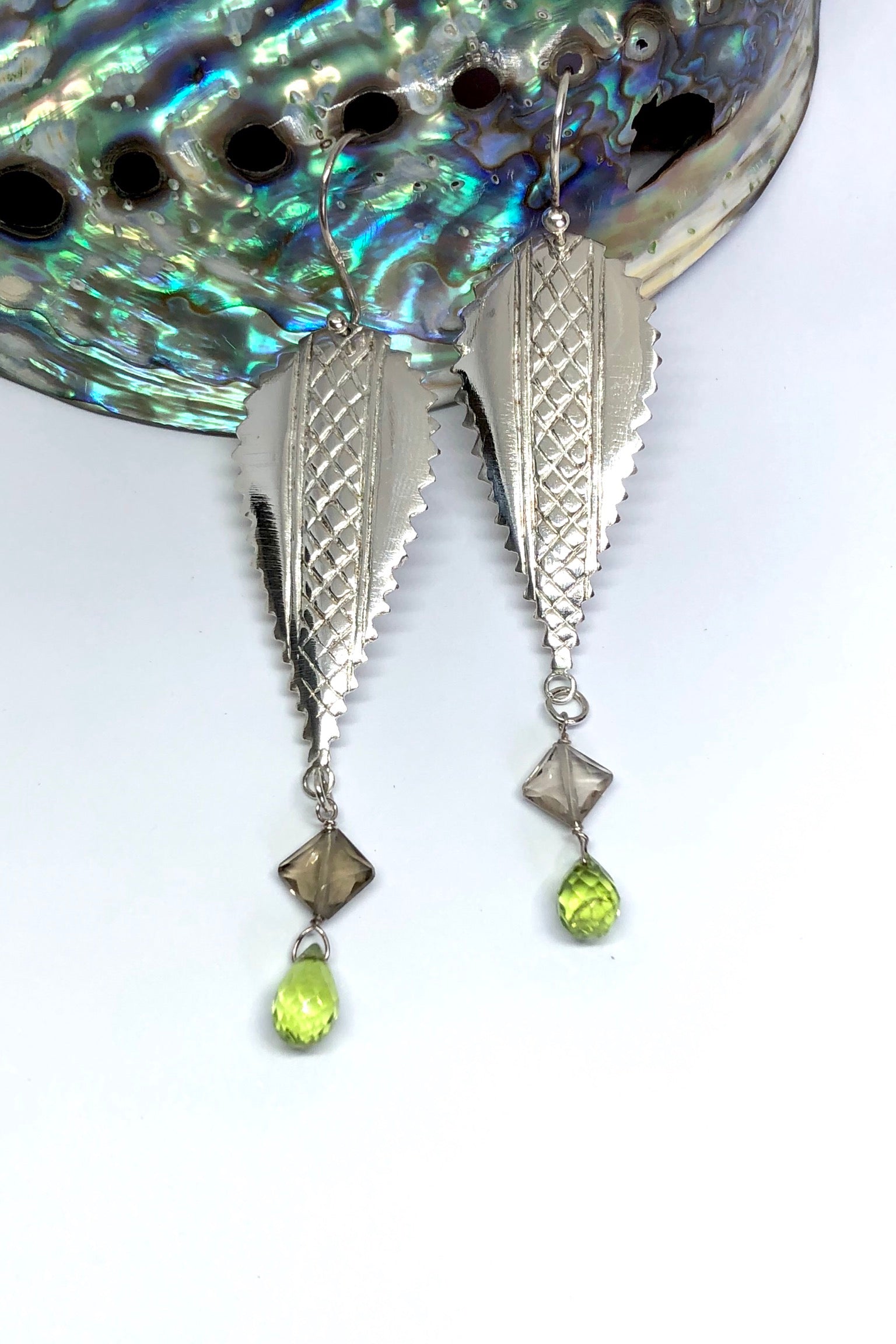 Echo Earrings Peridot Silver Shield