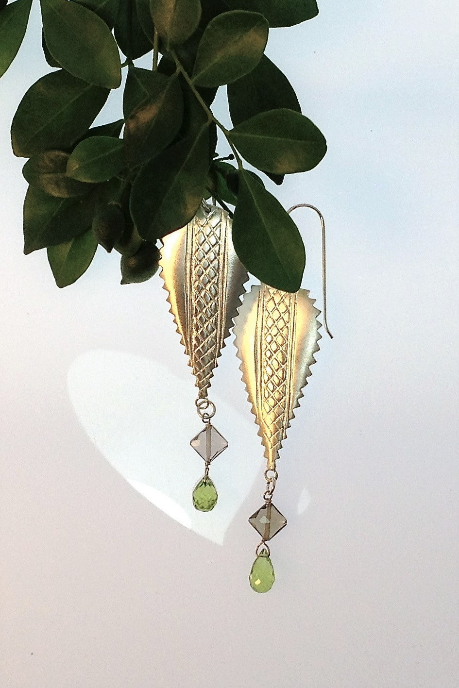 Echo Earrings Peridot Silver Shield