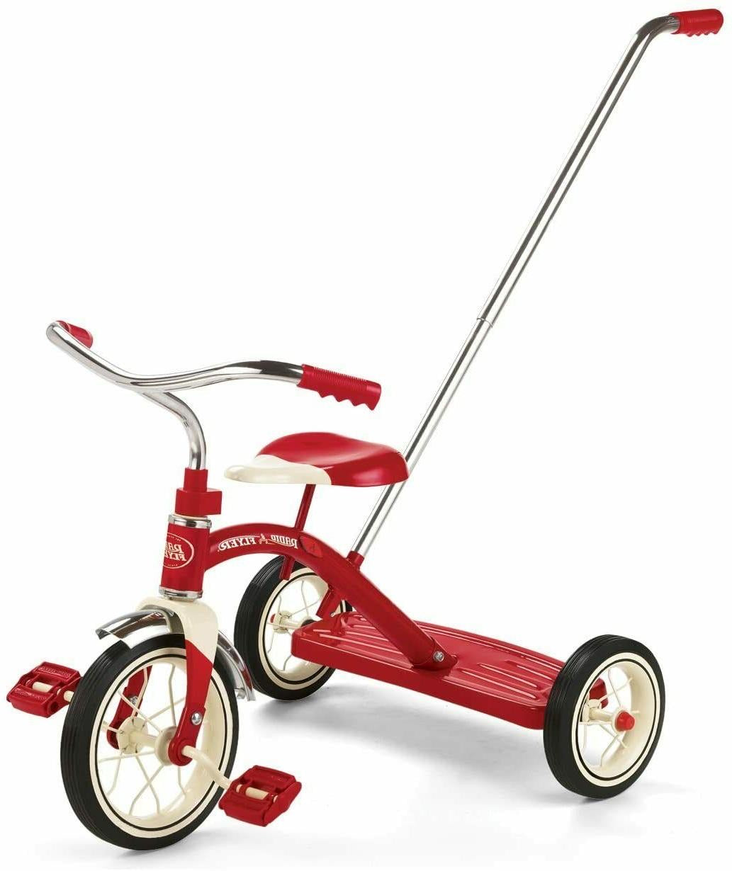 classic red tricycle with push handle