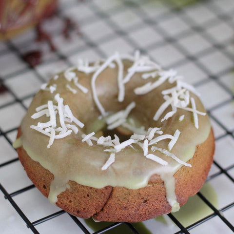 Photo of matcha cake donut with coconut on top