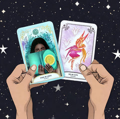 hands holding the page of coins and six of cups cards from The Crystal Magic Tarot deck with a background of a starry night sky