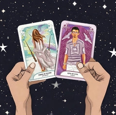 Three of wands and king of cups cards from he crystal magic tarot deck held up with two hands with a background of stars