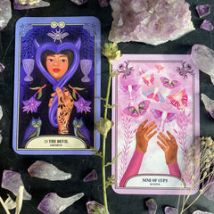 The Devil Tarot card and nine of cups from The Crystal Magic tarot deck