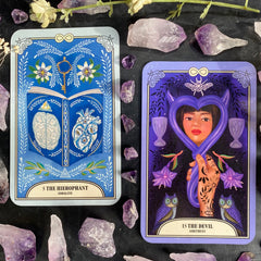 The Devil Tarot card and the hierophant from The Crystal Magic tarot deck with Amethyst crystals