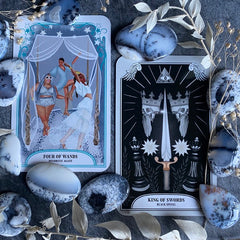 The crystal magic tarot four of wands and king of swords