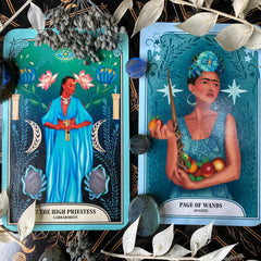 The Crystal Magic Tarot High Priestess and the Page of Wands with labradorite crystals and dried flowers
