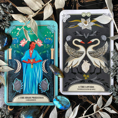 The Crystal Magic Tarot High Priestess and the Lovers with labradorite crystals and dried flowers