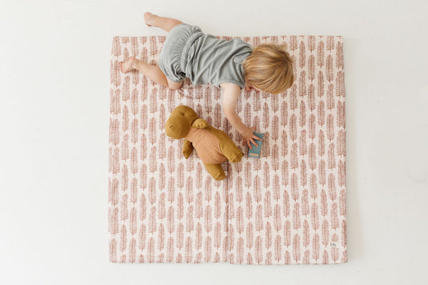 baby crawling on toki mats play mat