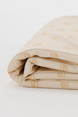 a folded vegan leather toki mat