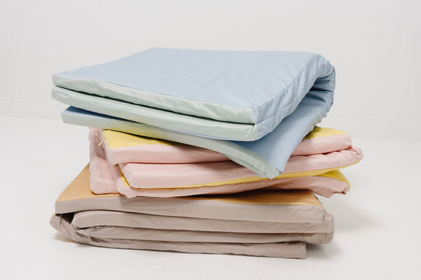 toki mats play mats with organic cotton covers all stacked up