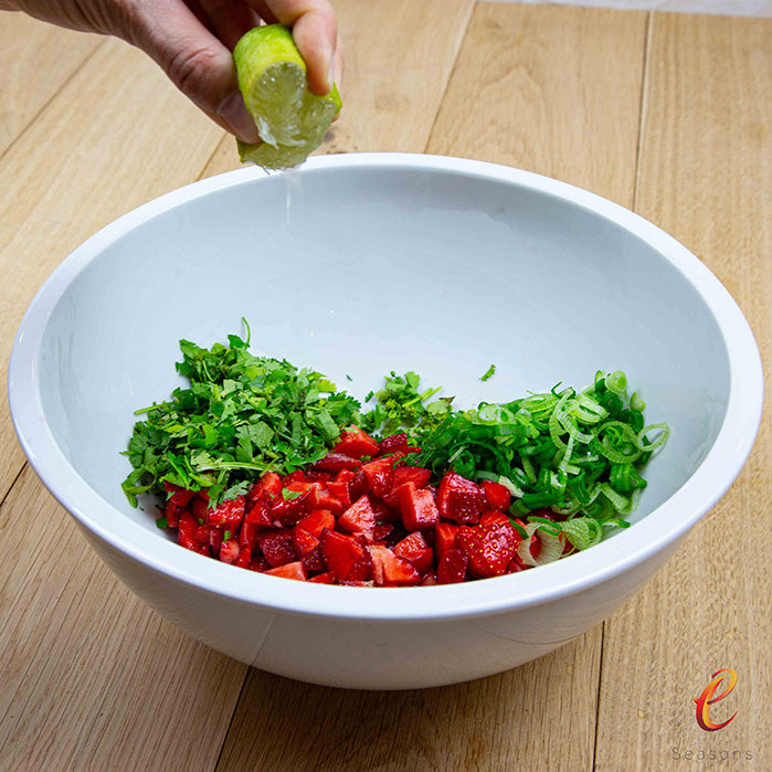 eSeasons Strawberry Season- Salmon Balsamic Strawberry. Adding a dash of lime juice to the bowl of topping