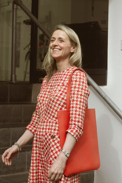 Kate Stephens, CEO of Smart Works with BEEN London bag