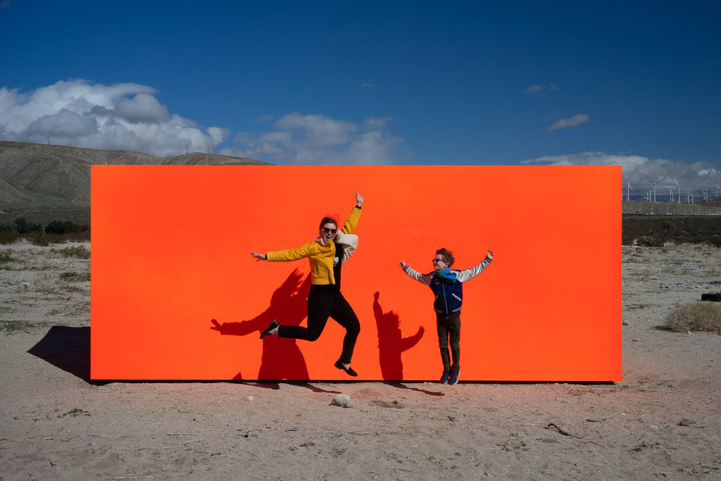 Sterling Ruby Specter Desert X19 Palm Springs fluorescent orange block people jumping