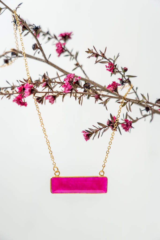 pink bena necklace Janna Conner on wildflower branch