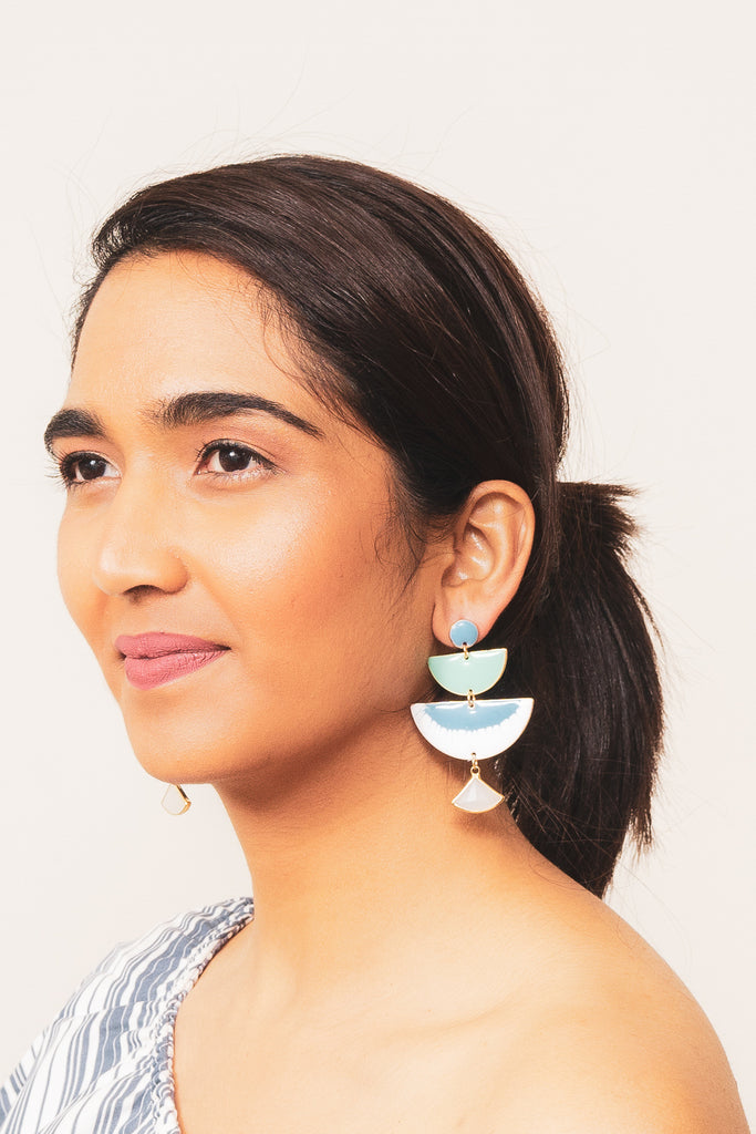 maurelle blue and white enamel chandelier earrings on model